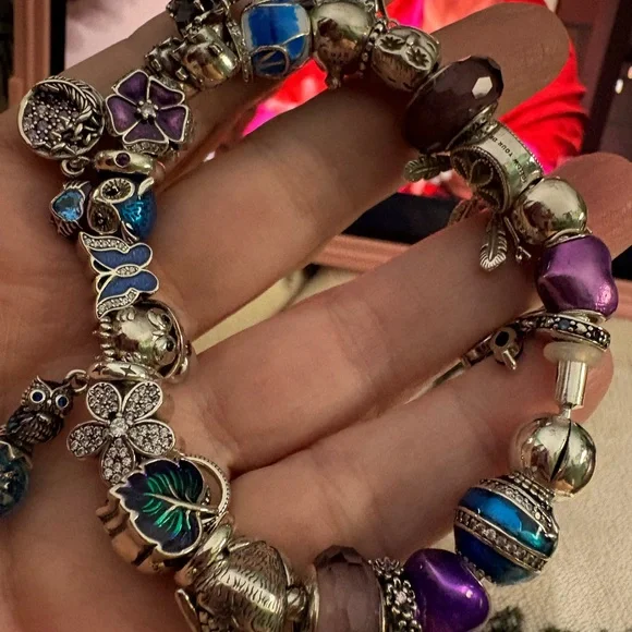 Linx bracelet with owl and butterfly charms